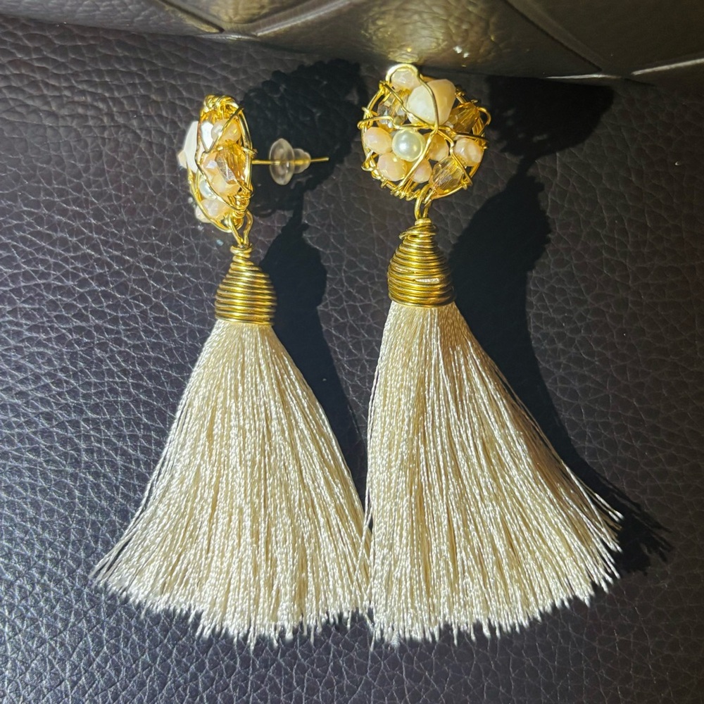 Elegant Gold and Cream Tassel Earrings
